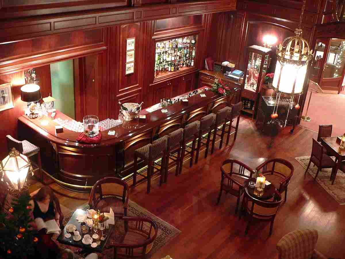 Empty bar counter and stools inside a nightclub
