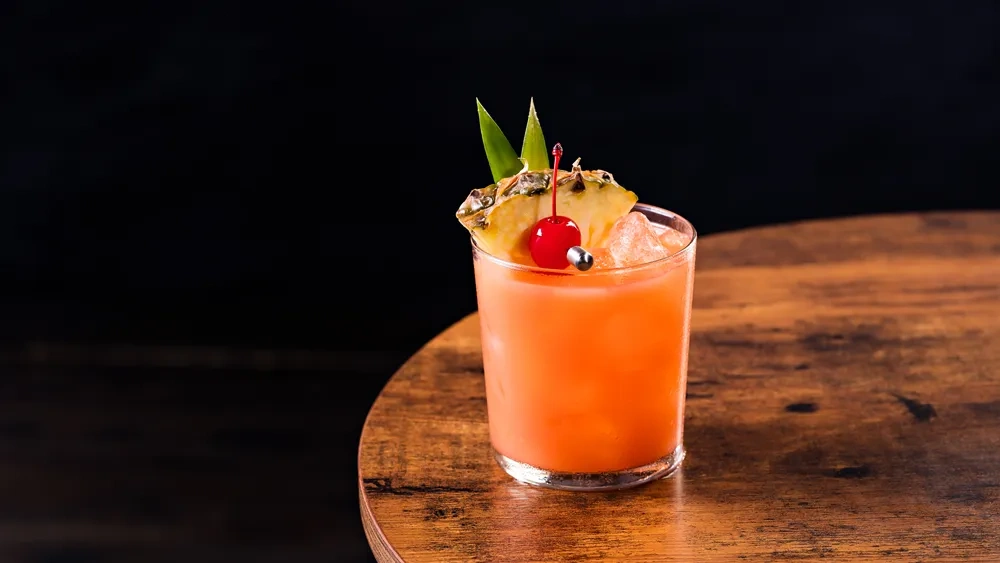 Bar serving a Mai Tai cocktail